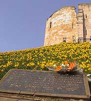 Flowers at Cliffords Tower Jewish memorial